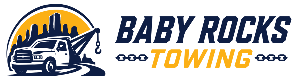 Baby Rocks Towing logo featuring a blue tow truck on a winding road with a yellow sun and dark mountain rock silhouettes in the background, flanked by chain link icons.